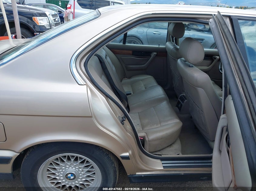 1991 BMW 5 series VIN WBAHD231XMBF70587 IAAI salvage auction — NORMAL WEAR, Affidavit In Lieu Of Title (Washington), sold $625 on 2026-07-14 (photo 8)