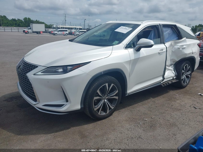 2021 Lexus Rx VIN JTJHZKEA6M2022033 IAAI salvage auction — LEFT SIDE, Salvage (Louisiana), sold $13,100 on 2026-07-29 (photo 2)