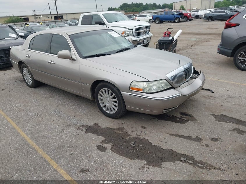 2003 Lincoln TOWN CAR VIN 1LNHM81W13Y673163 IAAI salvage auction — LEFT FRONT, Original (Texas), sold $425 on 2026-07-08 (photo 1)