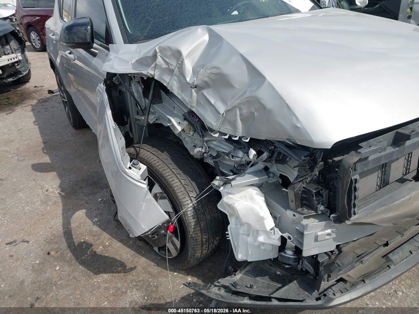 2025 Volvo Xc40 VIN YV4L12UC4S2479330 IAAI salvage auction — SIDE, Original (Texas), sold $6,800 on 2026-07-16 (photo 6)