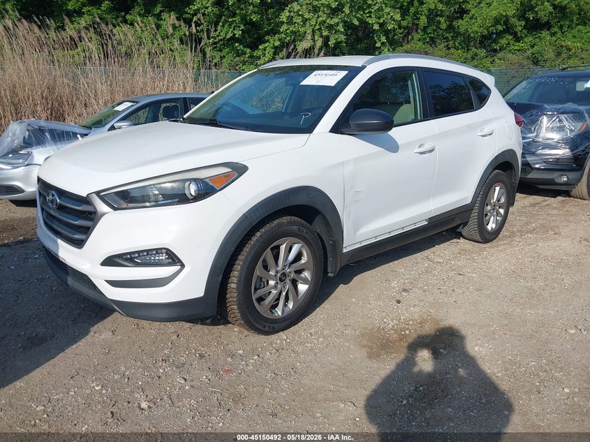 2016 Hyundai Tucson VIN KM8J33A42GU023776 IAAI salvage auction — SIDE, Clear (Maryland), sold $3,100 on 2026-07-16 (photo 2)