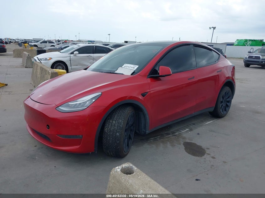 2022 Tesla Model y VIN 7SAYGDEE1NA019885 IAAI salvage auction — RIGHT FRONT, Original (Texas), sold $10,000 on 2026-07-29 (photo 2)