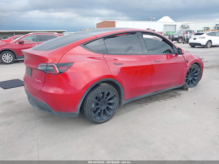 2022 Tesla Model y VIN 7SAYGDEE1NA019885 IAAI salvage auction — RIGHT FRONT, Original (Texas), sold $10,000 on 2026-07-29 (photo 4)