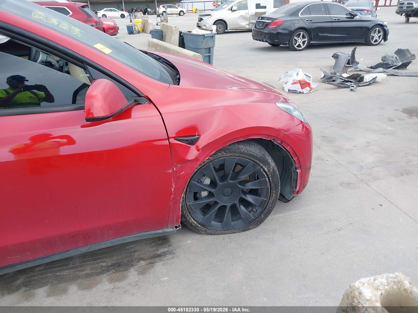 2022 Tesla Model y VIN 7SAYGDEE1NA019885 IAAI salvage auction — RIGHT FRONT, Original (Texas), sold $10,000 on 2026-07-29 (photo 6)