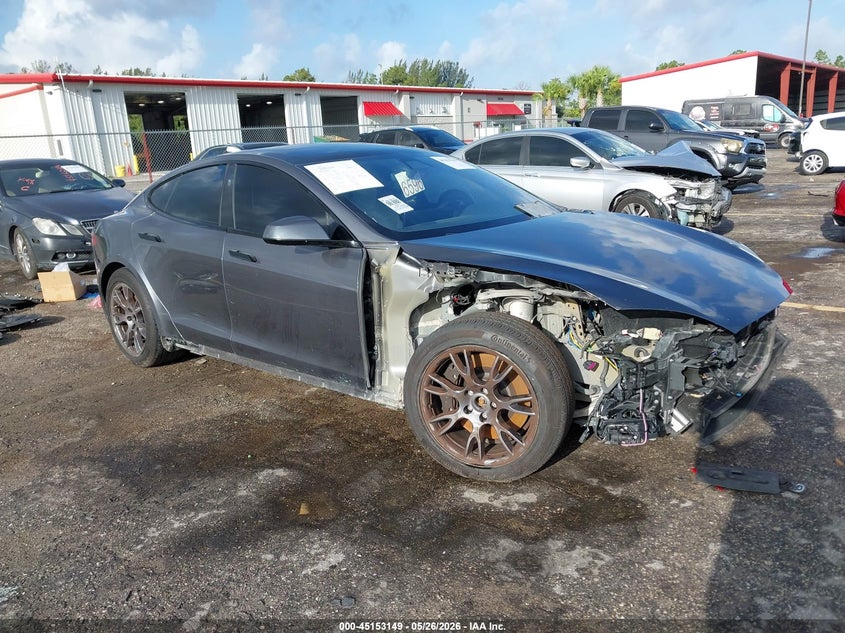 2021 Tesla Model s VIN 5YJSA1E55MF428413 IAAI salvage auction — FRONT END, Clear (Florida), sold $5,600 on 2026-07-13 (photo 1)