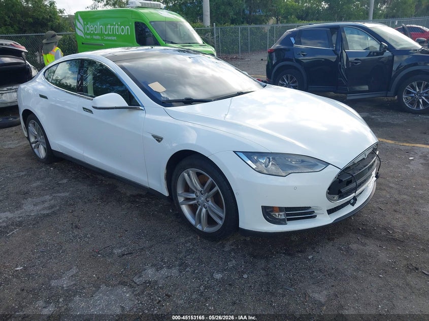 2014 Tesla Model s VIN 5YJSA1S16EFP52389 IAAI salvage auction — NORMAL WEAR, Clear (Montana), sold $725 on 2026-07-29 (photo 1)
