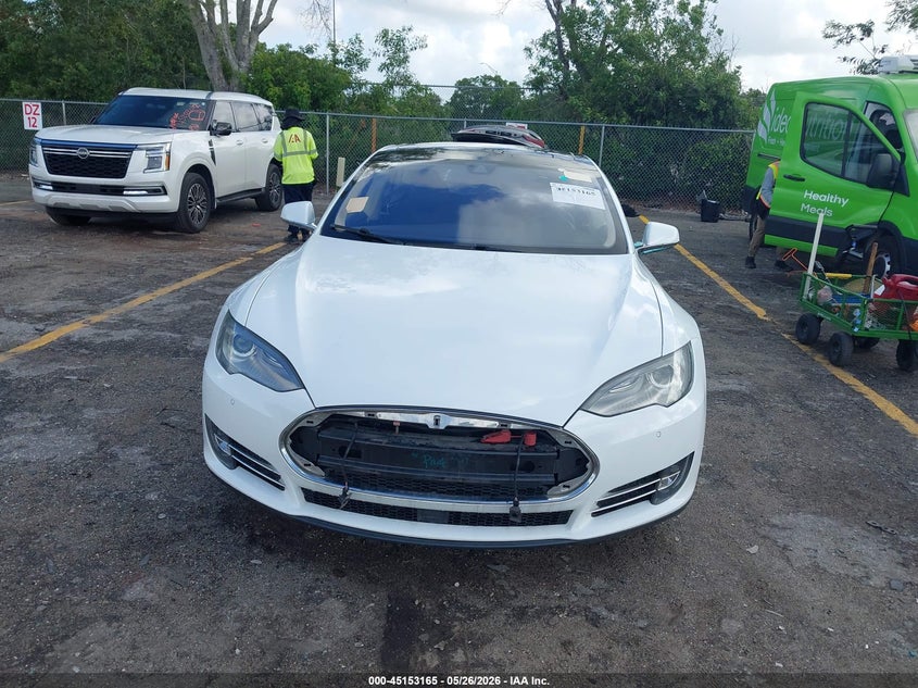 2014 Tesla Model s VIN 5YJSA1S16EFP52389 IAAI salvage auction — NORMAL WEAR, Clear (Montana), sold $725 on 2026-07-29 (photo 6)