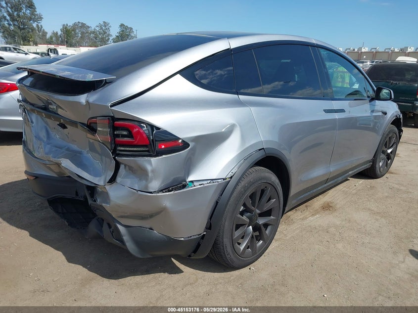 2025 Tesla Model x VIN 7SAXCBE5XSF469741 IAAI salvage auction — REAR END, Salvage Title, sold $42,350 on 2026-07-15 (photo 4)