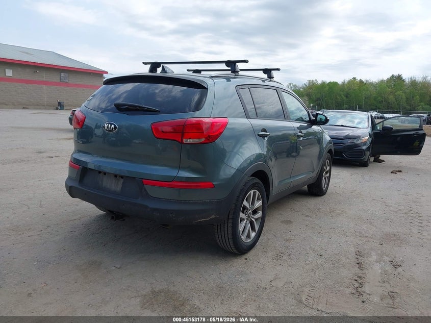2014 Kia Sportage VIN KNDPBCAC7E7564942 IAAI salvage auction — NORMAL WEAR, Clear (Montana), sold $1,500 on 2026-07-13 (photo 4)