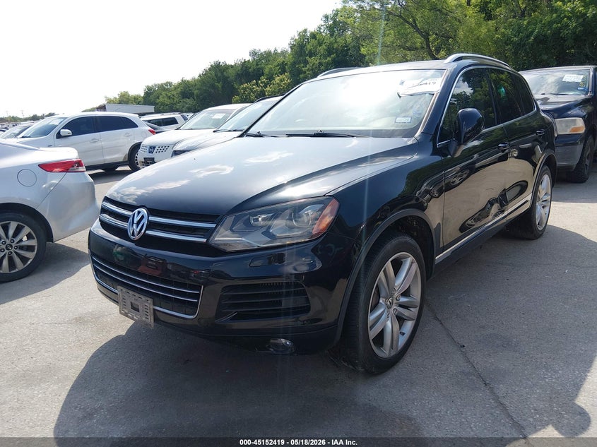 2011 Volkswagen Touareg VIN WVGFK9BP7BD005786 IAAI salvage auction — NORMAL WEAR, Original (Texas), sold $550 on 2026-08-10 (photo 2)