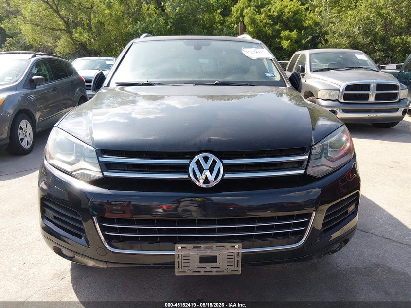2011 Volkswagen Touareg VIN WVGFK9BP7BD005786 IAAI salvage auction — NORMAL WEAR, Original (Texas), sold $550 on 2026-08-10 (photo 6)