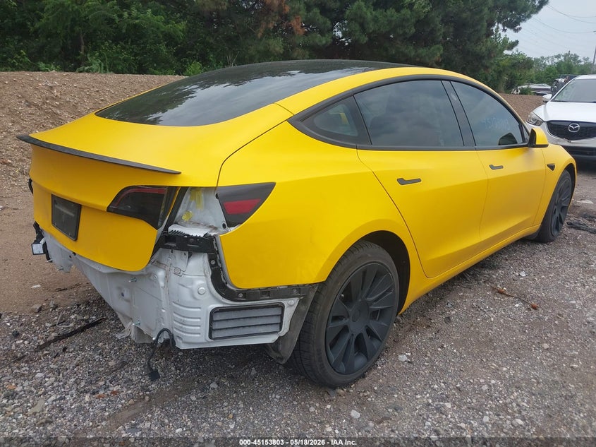 2021 Tesla Model 3 VIN 5YJ3E1EAXMF064317 IAAI salvage auction — REAR END, Salvage (Indiana), sold $5,675 on 2026-07-23 (photo 4)