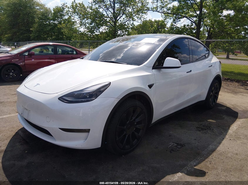 2024 Tesla Model y VIN 7SAYGDEE0RA332223 IAAI salvage auction — SIDE, Salvage (New Jersey), sold $18,800 on 2026-07-16 (photo 2)