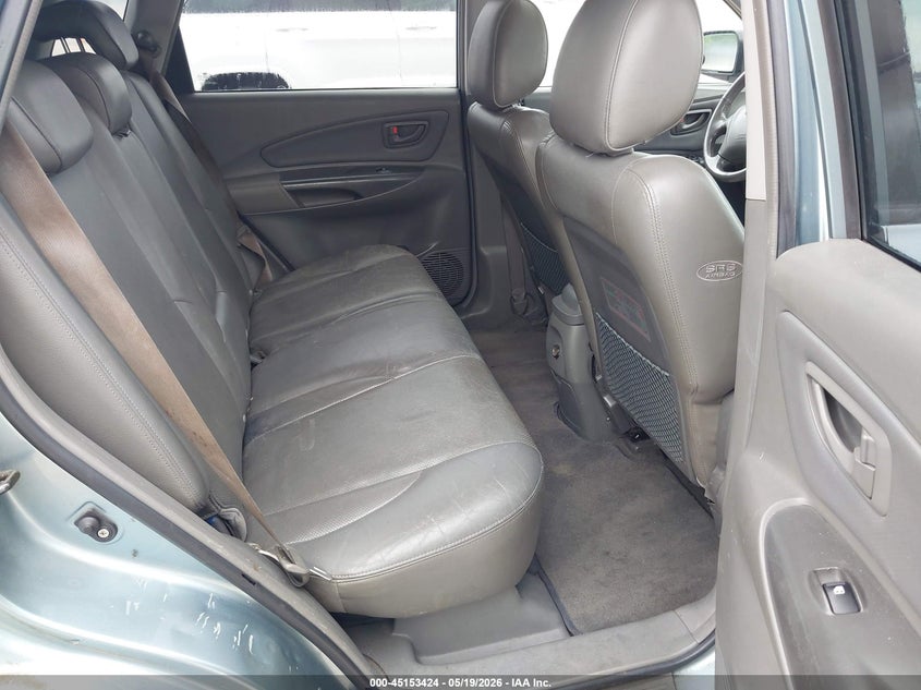 2006 Hyundai Tucson VIN KM8JN72D46U364448 IAAI salvage auction — NORMAL WEAR, Repossessed (Missouri), sold $200 on 2026-07-21 (photo 8)