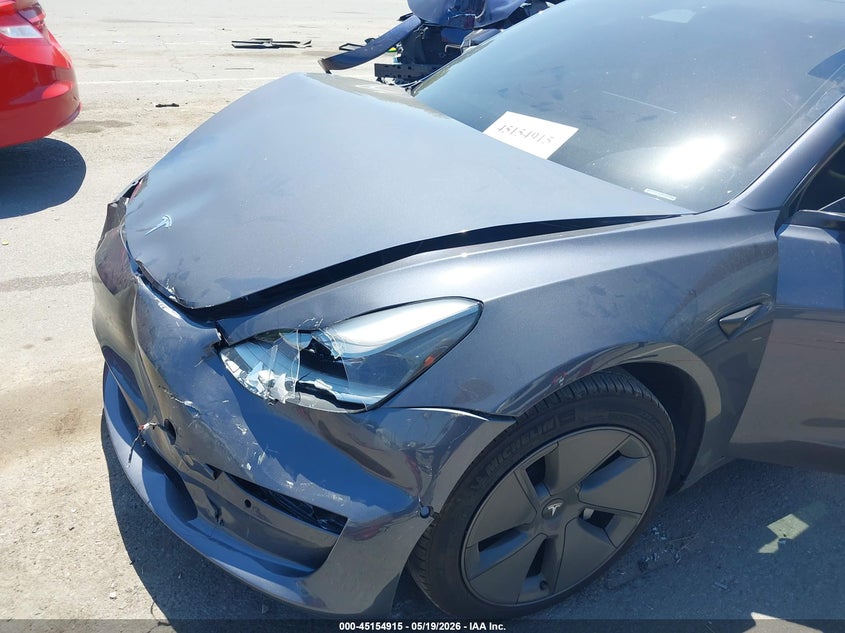 2022 Tesla Model y VIN 7SAYGAEE8NF380998 IAAI salvage auction — FRONT END, Salvage (Idaho), sold $10,750 on 2026-07-09 (photo 6)