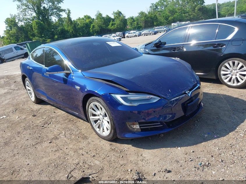 2020 Tesla Model s VIN 5YJSA1E21LF385113 IAAI salvage auction — FRONT & REAR, Wait Title, sold $9,850 on 2026-09-11 (photo 1)