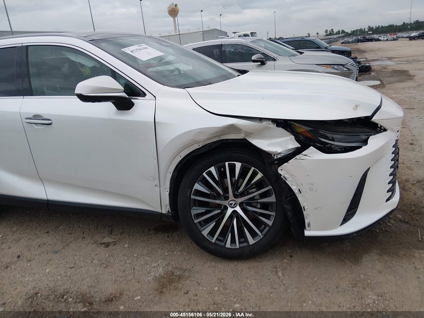 2023 Lexus Rx VIN 2T2BAMBA2PC013833 IAAI salvage auction — RIGHT FRONT, Original (Texas), sold $29,600 on 2026-10-01 (photo 6)