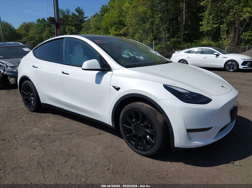 2023 Tesla Model y VIN 7SAYGDEE7PA198050 IAAI salvage auction — LEFT SIDE, Salvage (New Hampshire), sold $14,000 on 2026-07-30 (photo 1)