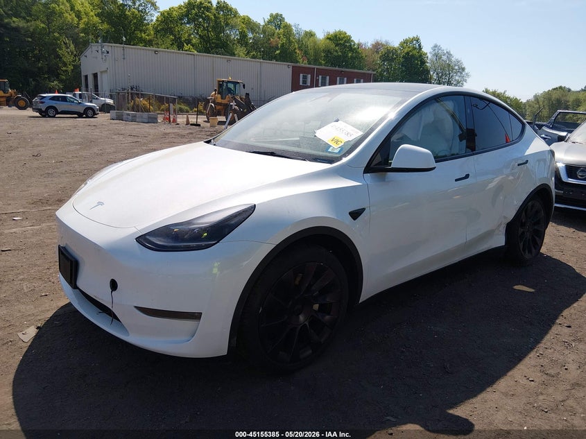 2023 Tesla Model y VIN 7SAYGDEE7PA198050 IAAI salvage auction — LEFT SIDE, Salvage (New Hampshire), sold $14,000 on 2026-07-30 (photo 2)
