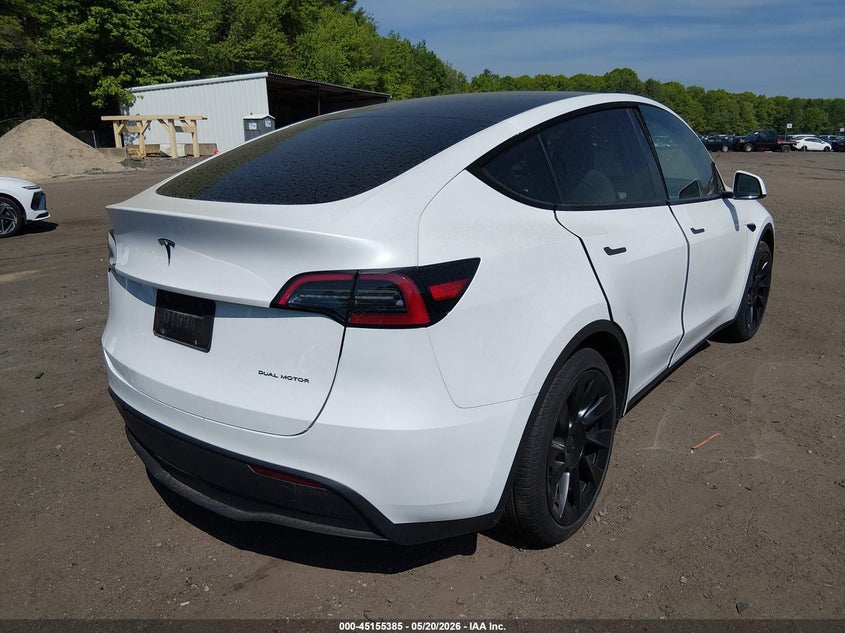 2023 Tesla Model y VIN 7SAYGDEE7PA198050 IAAI salvage auction — LEFT SIDE, Salvage (New Hampshire), sold $14,000 on 2026-07-30 (photo 4)