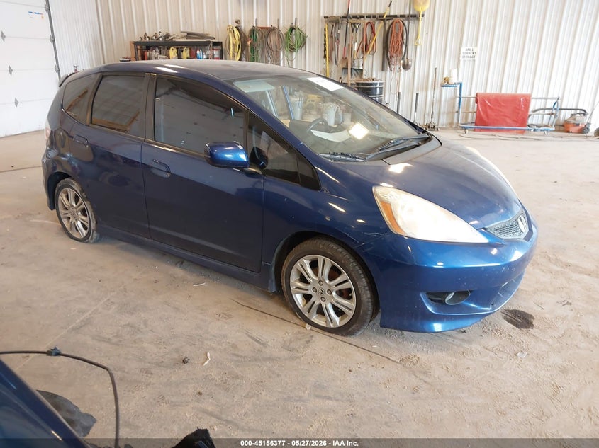 2010 Honda Fit VIN JHMGE8H4XAC024567 IAAI salvage auction — LEFT SIDE, Clear (Michigan), sold $400 on 2026-07-14 (photo 1)