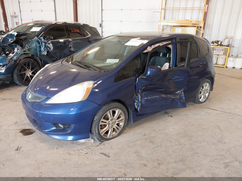 2010 Honda Fit VIN JHMGE8H4XAC024567 IAAI salvage auction — LEFT SIDE, Clear (Michigan), sold $400 on 2026-07-14 (photo 2)