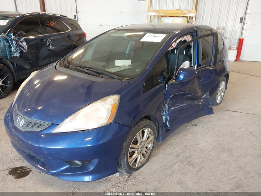 2010 Honda Fit VIN JHMGE8H4XAC024567 IAAI salvage auction — LEFT SIDE, Clear (Michigan), sold $400 on 2026-07-14 (photo 6)