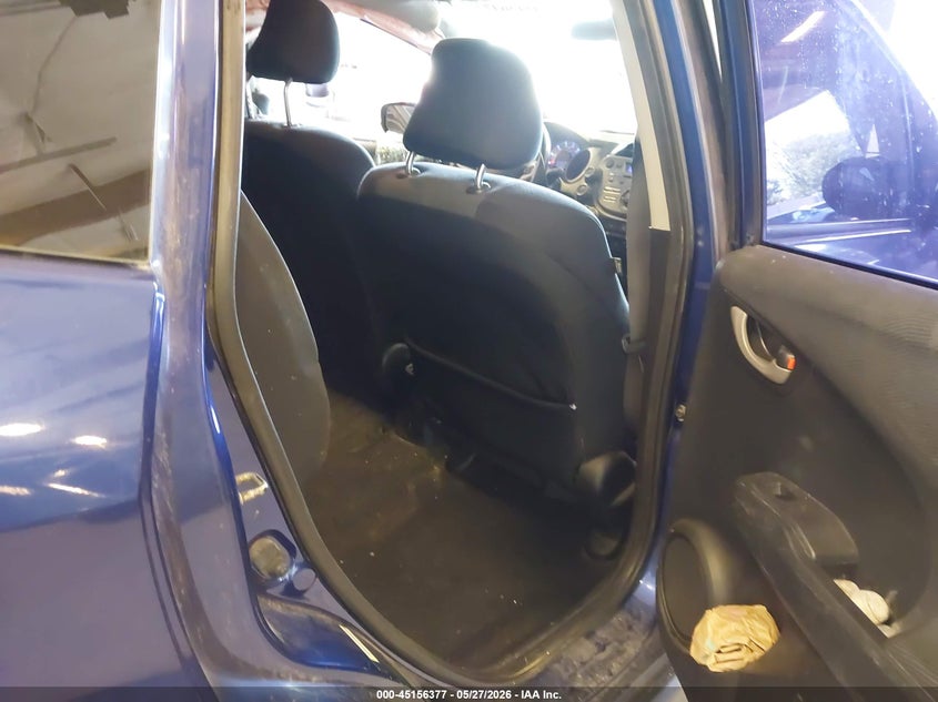 2010 Honda Fit VIN JHMGE8H4XAC024567 IAAI salvage auction — LEFT SIDE, Clear (Michigan), sold $400 on 2026-07-14 (photo 8)