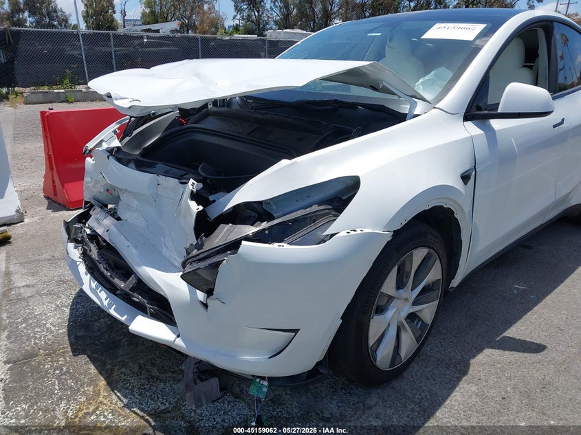 2023 Tesla Model y VIN 7SAYGDEE4PF630113 IAAI salvage auction — FRONT END, Salvage Title, sold $7,650 on 2026-09-03 (photo 6)
