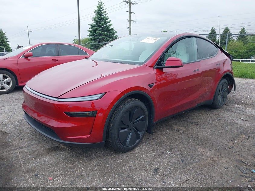 2026 Tesla Model y VIN 7SAYGDEE5TA669218 IAAI salvage auction — REAR END, Clear (Michigan), sold $23,500 on 2026-07-10 (photo 2)