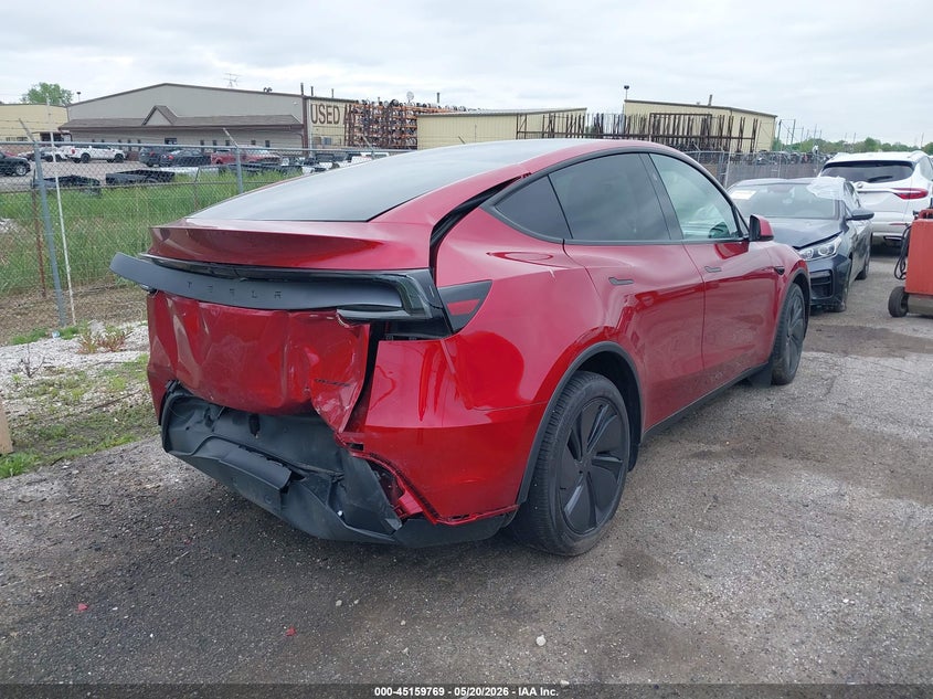 2026 Tesla Model y VIN 7SAYGDEE5TA669218 IAAI salvage auction — REAR END, Clear (Michigan), sold $23,500 on 2026-07-10 (photo 4)