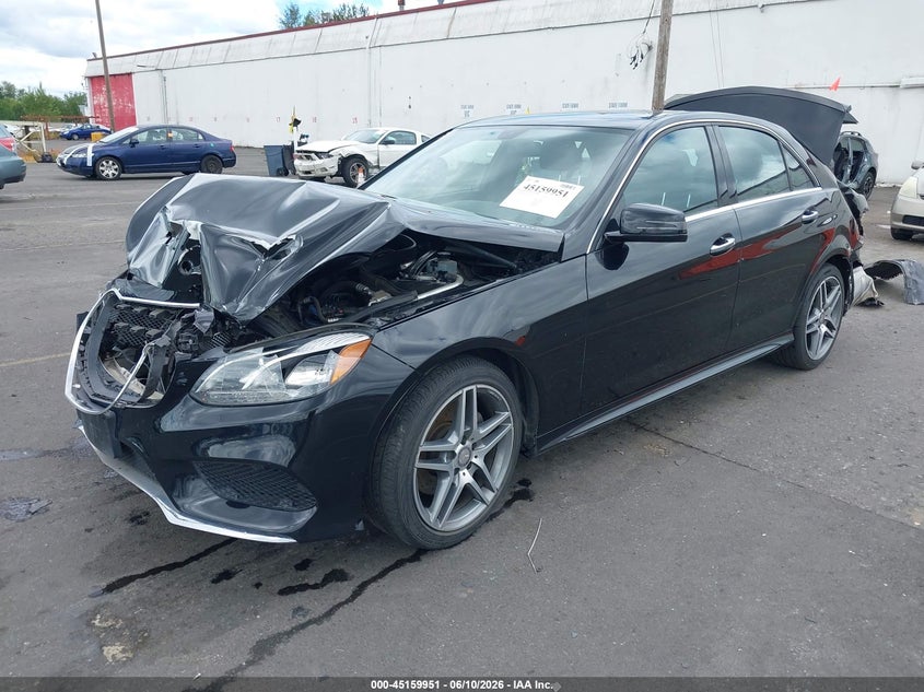 2016 Mercedes-benz E-klasse VIN WDDHF5KB6GB311238 IAAI salvage auction — FRONT & REAR, Salvage (Oregon), sold $975 on 2026-07-16 (photo 2)