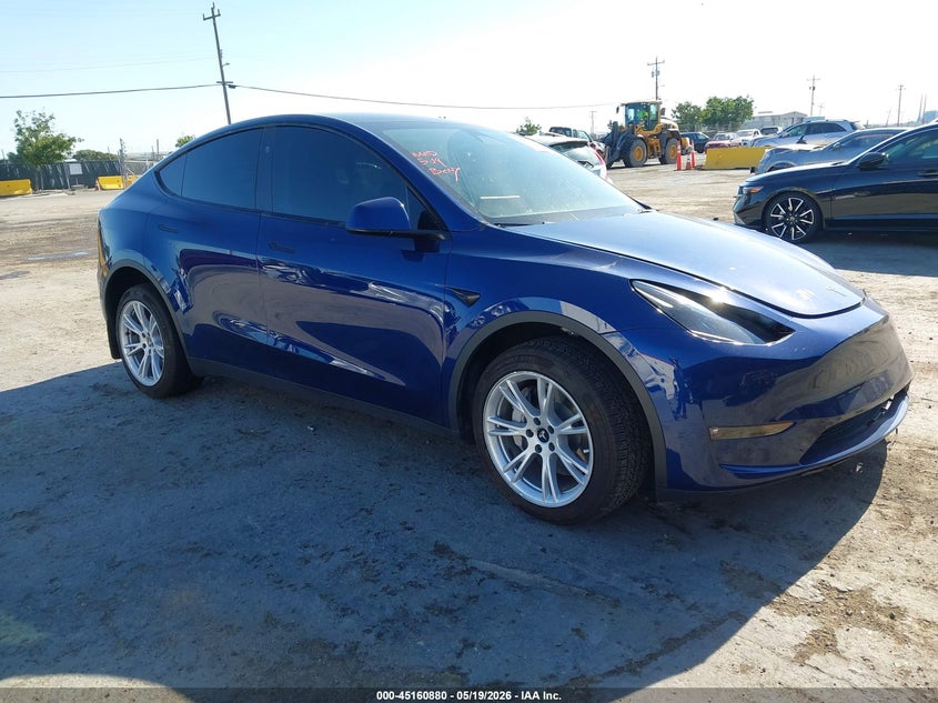 2023 Tesla Model y VIN 7SAYGDEE8PF807570 IAAI salvage auction — LEFT FRONT, Salvage (California), sold $25 on 2026-07-30 (photo 1)