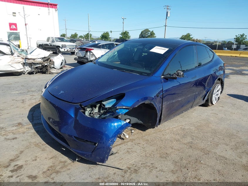 2023 Tesla Model y VIN 7SAYGDEE8PF807570 IAAI salvage auction — LEFT FRONT, Salvage (California), sold $25 on 2026-07-30 (photo 2)
