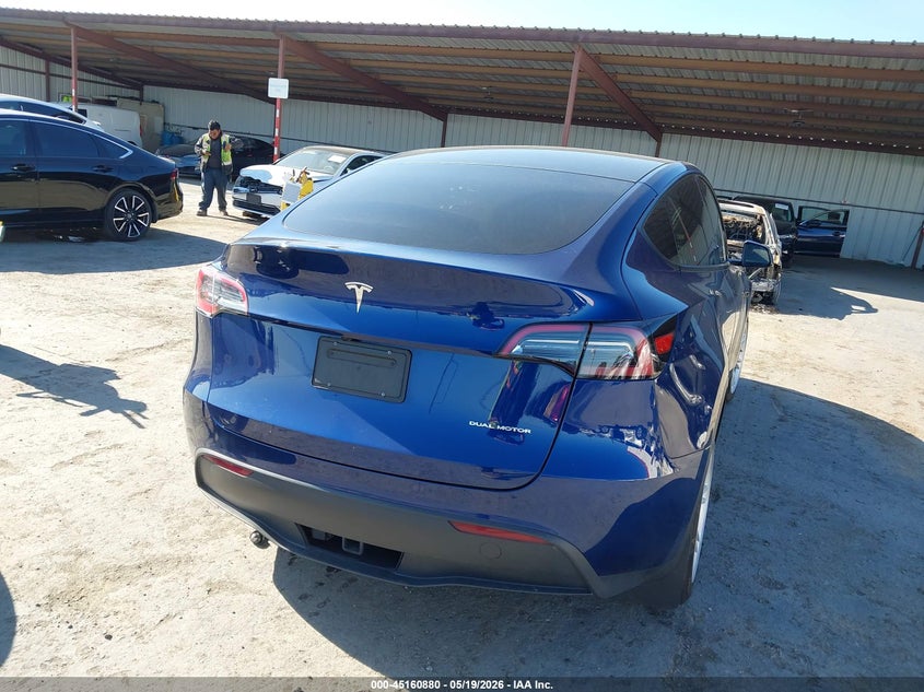 2023 Tesla Model y VIN 7SAYGDEE8PF807570 IAAI salvage auction — LEFT FRONT, Salvage (California), sold $25 on 2026-07-30 (photo 4)
