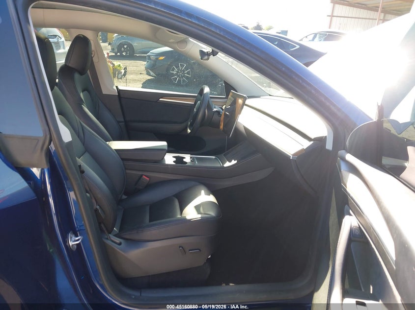 2023 Tesla Model y VIN 7SAYGDEE8PF807570 IAAI salvage auction — LEFT FRONT, Salvage (California), sold $25 on 2026-07-30 (photo 5)