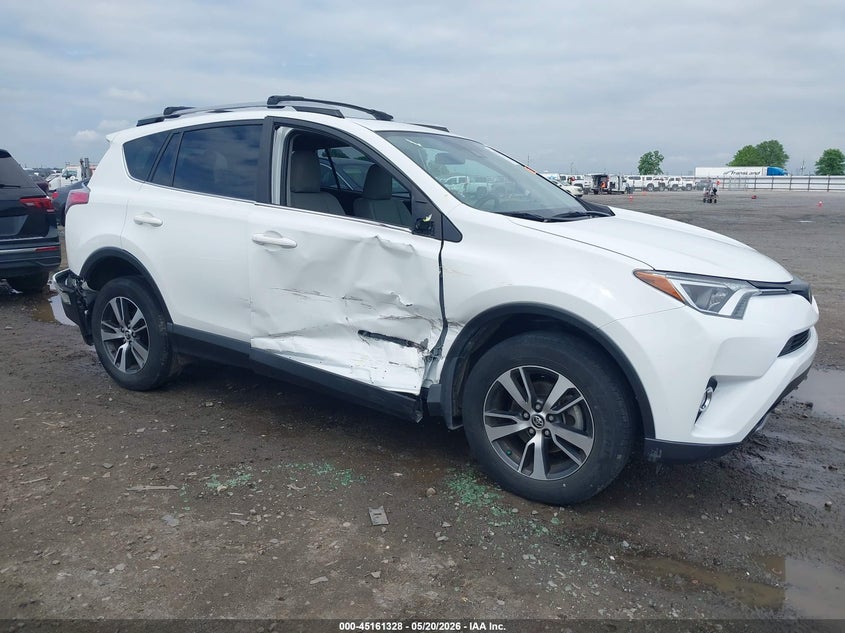 2018 Toyota Rav 4 VIN JTMWFREV3JJ729929 IAAI salvage auction — RIGHT SIDE, Clear (Arkansas), sold $7,600 on 2026-07-29 (photo 6)