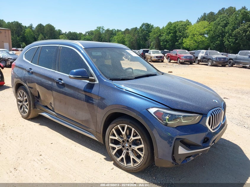 2021 BMW X1 VIN WBXJG7C03M5S24878 IAAI salvage auction — SIDE, Salvage (North Carolina), sold $7,100 on 2026-07-10 (photo 1)