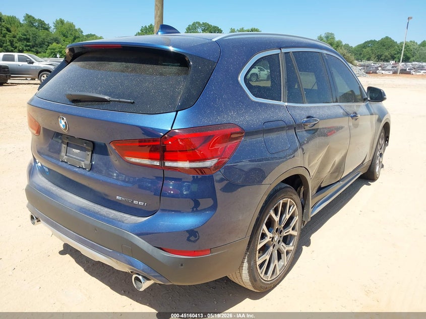 2021 BMW X1 VIN WBXJG7C03M5S24878 IAAI salvage auction — SIDE, Salvage (North Carolina), sold $7,100 on 2026-07-10 (photo 4)