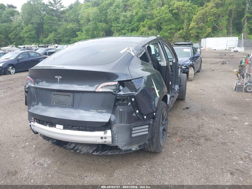 2024 Tesla Model y VIN 7SAYGDEE8RA296281 IAAI salvage auction — ALL OVER, Salvage Title, sold $8,500 on 2026-07-15 (photo 4)