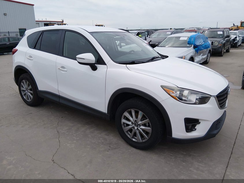 2016 Mazda Cx-5 VIN JM3KE2CY1G0871157 IAAI salvage auction — LEFT SIDE, Original (Texas), sold $2,650 on 2026-07-28 (photo 1)