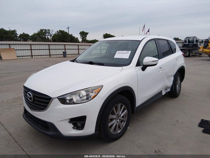 2016 Mazda Cx-5 VIN JM3KE2CY1G0871157 IAAI salvage auction — LEFT SIDE, Original (Texas), sold $2,650 on 2026-07-28 (photo 2)