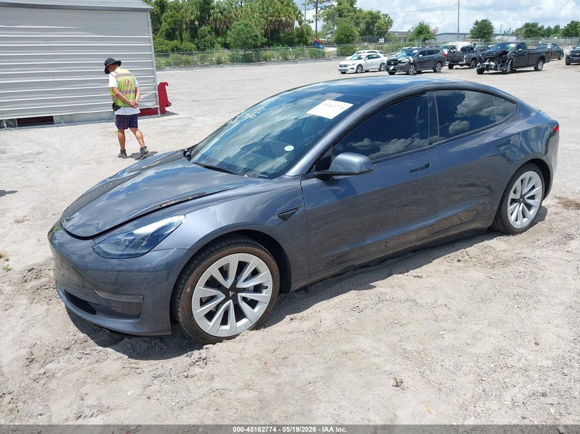 2023 Tesla Model 3 VIN 5YJ3E1EA0PF676482 IAAI salvage auction — RIGHT FRONT, Rebuildable (Florida), sold $8,800 on 2026-07-16 (photo 2)