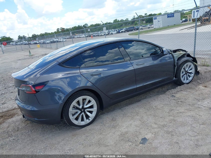 2023 Tesla Model 3 VIN 5YJ3E1EA0PF676482 IAAI salvage auction — RIGHT FRONT, Rebuildable (Florida), sold $8,800 on 2026-07-16 (photo 4)