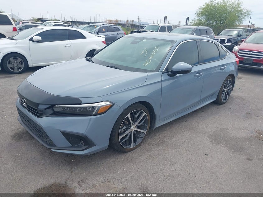 2023 Honda Civic VIN 2HGFE1F94PH303085 IAAI salvage auction — SIDE, Salvage (Arizona), sold $10,800 on 2026-07-09 (photo 2)