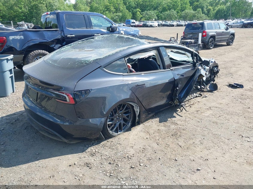 2026 Tesla Model 3 VIN 5YJ3E1EA1TF147052 IAAI salvage auction — ROLLOVER, Salvage (Idaho), sold $1,000 on 2026-07-29 (photo 4)