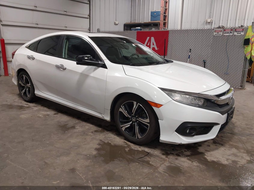 2017 Honda Civic VIN 19XFC1F99HE000398 IAAI salvage auction — HAIL, Regular Certificate (Iowa), sold $6,950 on 2026-07-28 (photo 1)