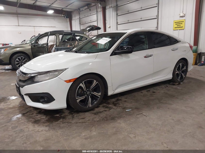 2017 Honda Civic VIN 19XFC1F99HE000398 IAAI salvage auction — HAIL, Regular Certificate (Iowa), sold $6,950 on 2026-07-28 (photo 2)