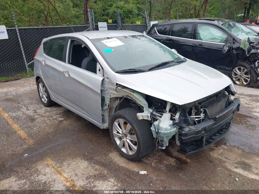 2014 Hyundai Accent VIN KMHCU5AE3EU173970 IAAI salvage auction — FRONT END, Salvage (Kansas), sold $1,100 on 2026-07-15 (photo 1)