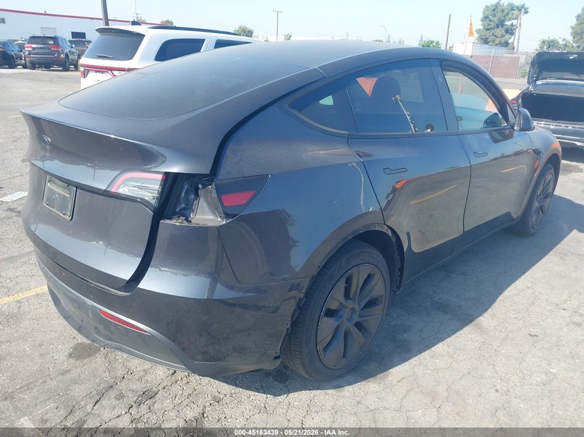 2024 Tesla Model y VIN 7SAYGDED0RF114468 IAAI salvage auction — LEFT SIDE, Salvage (California), sold $6,800 on 2026-07-29 (photo 4)